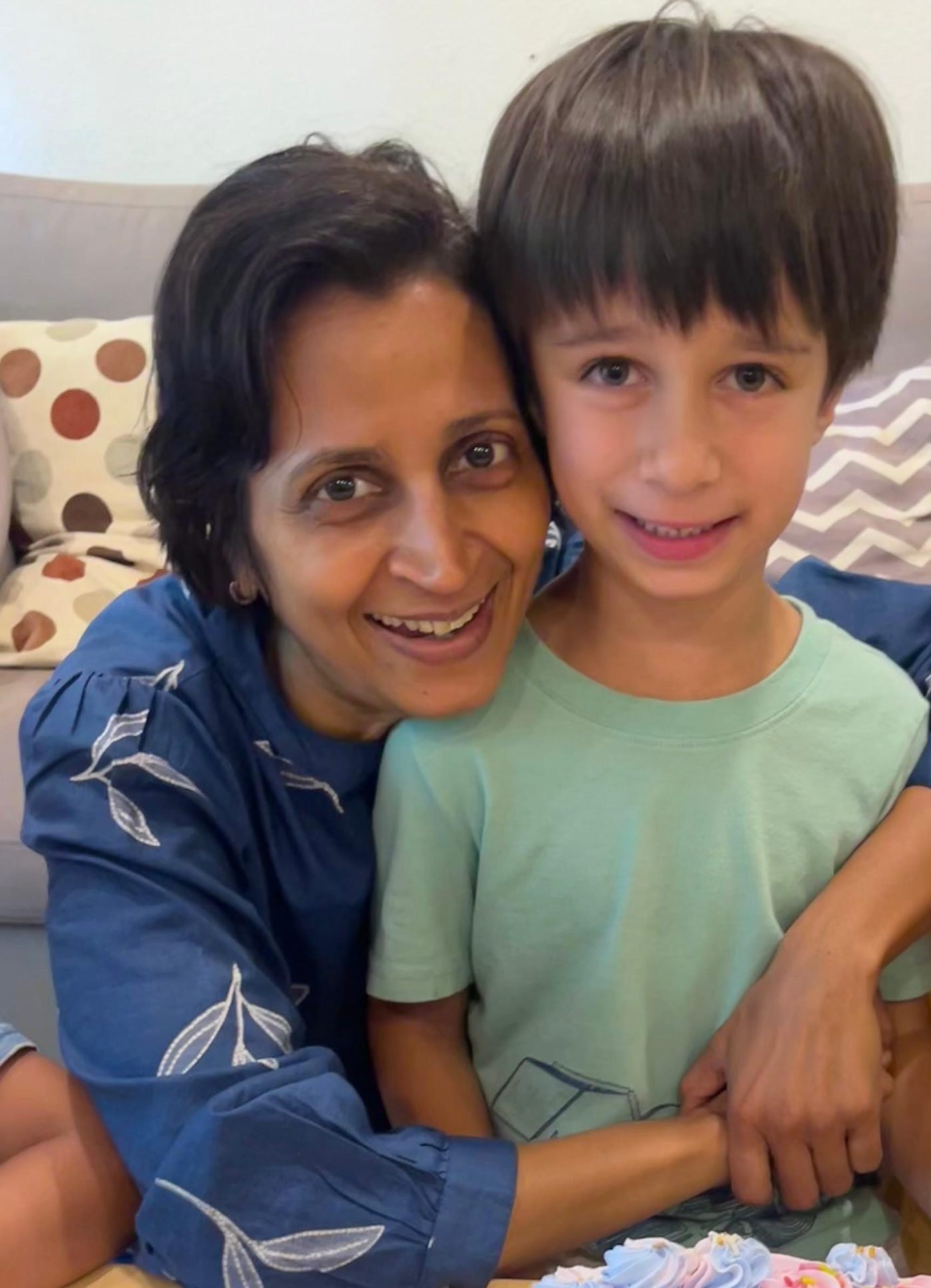 Sarika, founder and lead teacher, with her son