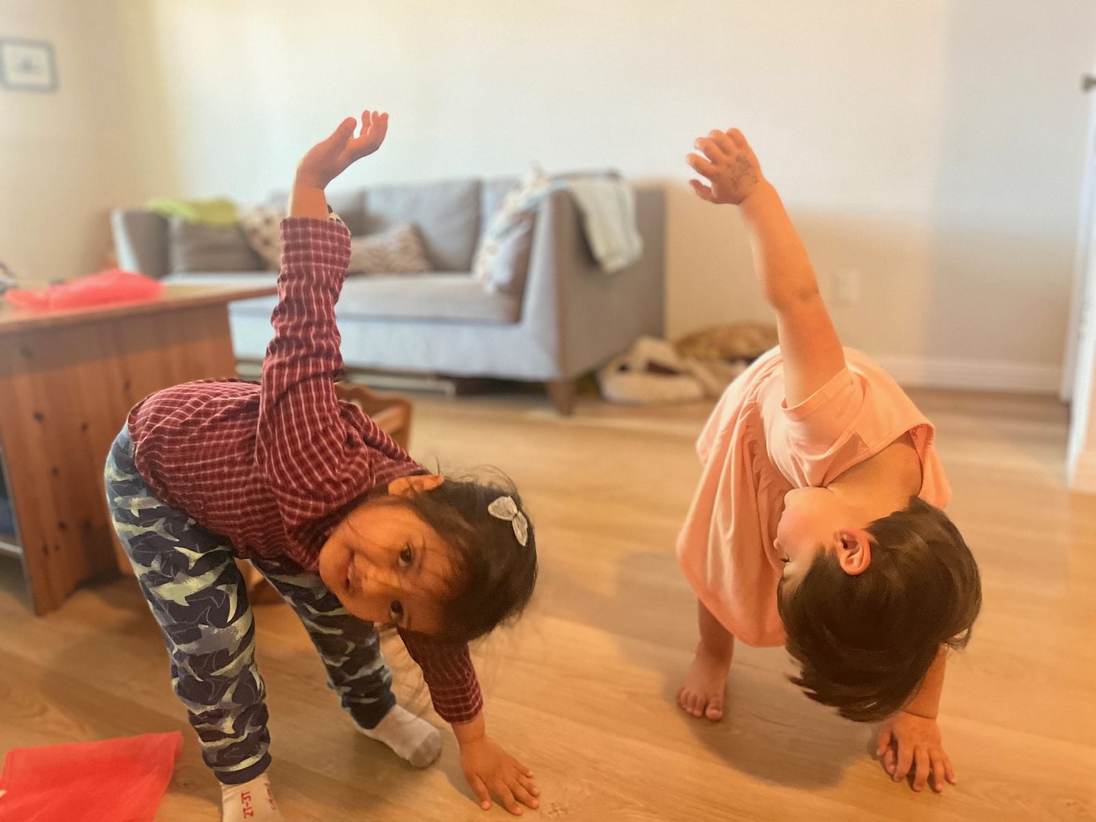 Children doing playful movement indoors